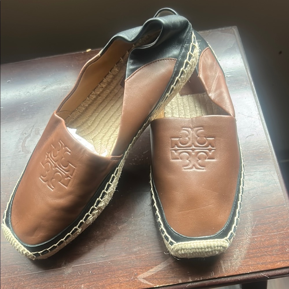 Tory Burch Brown and Black Flats with Elegant Design